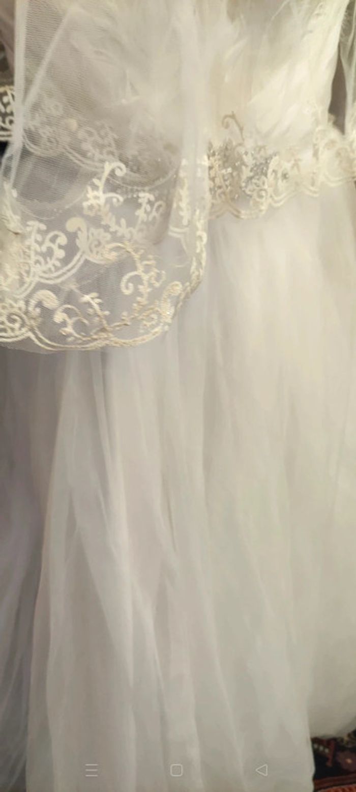 Robe de mariée bustier 36 "princesse" plumes et strass avec traîne et voile - photo numéro 13