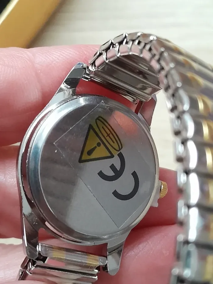 Montre quartz, bracelet élastic, dorée et argentée - photo numéro 5