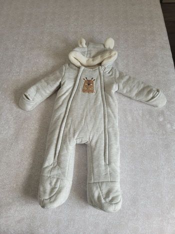 Combinaison en bon état orchestra 6 mois