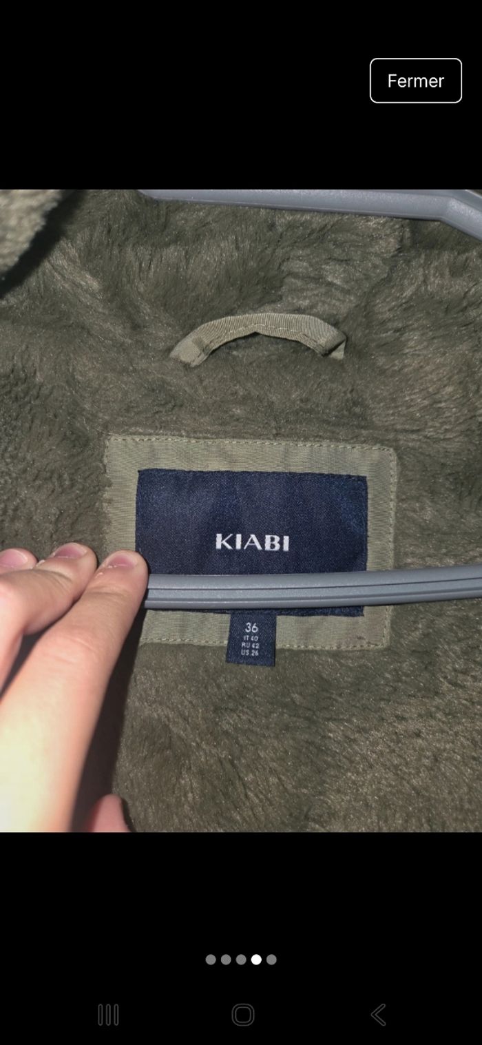 Manteau kaki avec un intérieur fausse fourrure - photo numéro 4