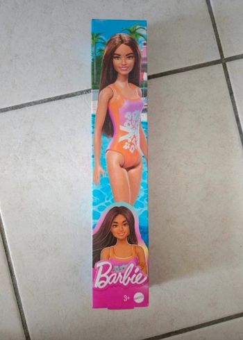 Barbie en maillot de bain
Neuve