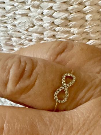 Bague réglable  infini acier inoxydable or et zircons
