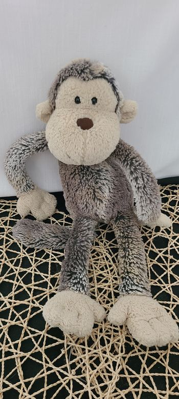 Doudou Singe marron gris chiné et beige JELLYCAT