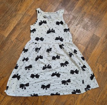 Robe fille blanche imprimé nœud noir h&m taille 10ans