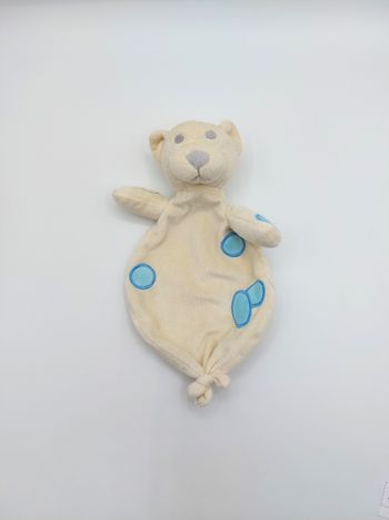 Doudou plat ours écru crème DECAROLI COSFIBEL rond bleu yeux gris