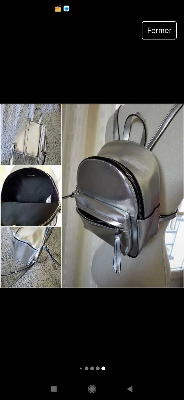 Sac à dos argenté bon état