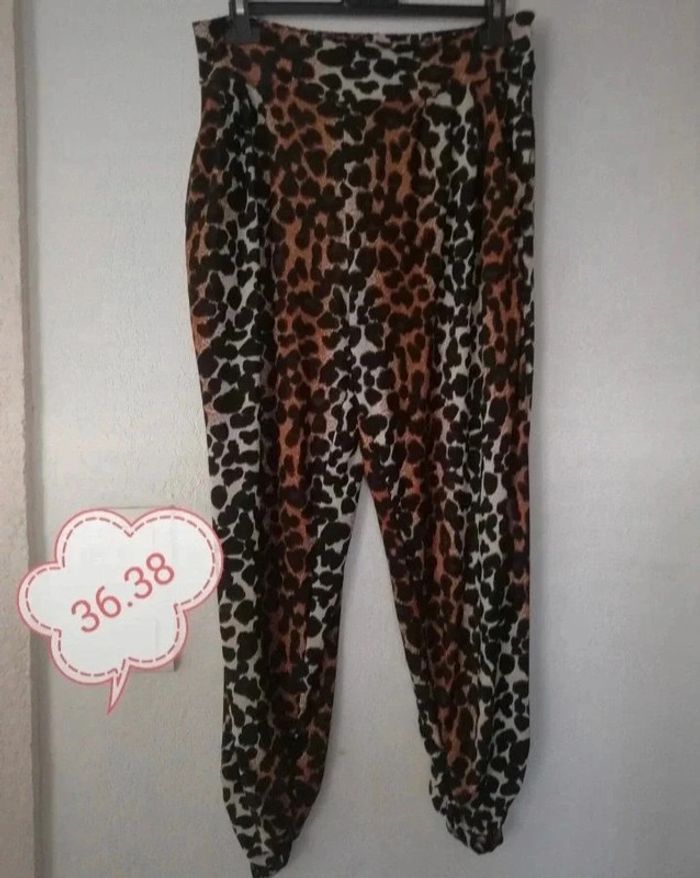 Pantalon large léopard femme.36/38..
