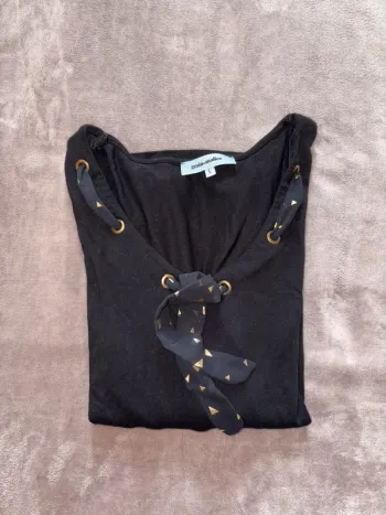 Pull noir femme taille 40 grain de malice en très bon état.