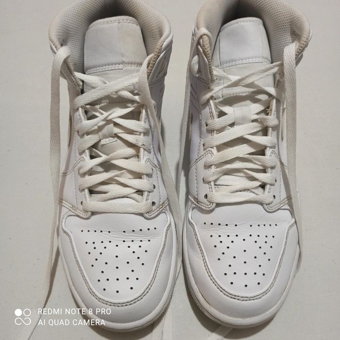 Chaussure montante Nike Jordan 1 mid
