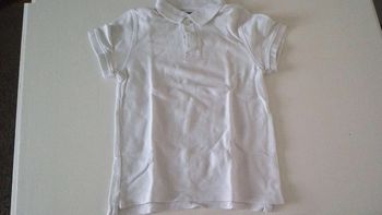 Polo blanc tres bon etat T8A