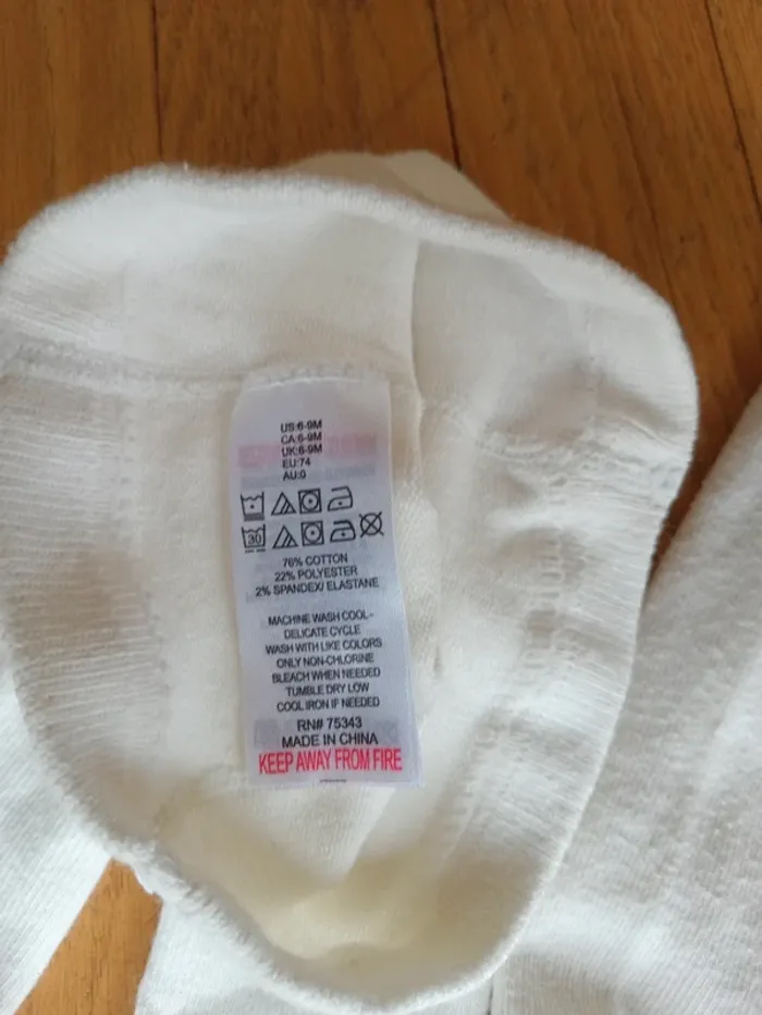 Lot 2 collants fille 6-9 mois - 1 neuf, 1 TBE - photo numéro 10
