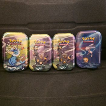 Lot de 3 Mini Tins EV8.5 Aquali / 2 Noctali + 1 Mini Tin Pouvoir de Kanto Mew (EB10/EB11)