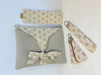 Pochette à livre Beige à motifs dorés