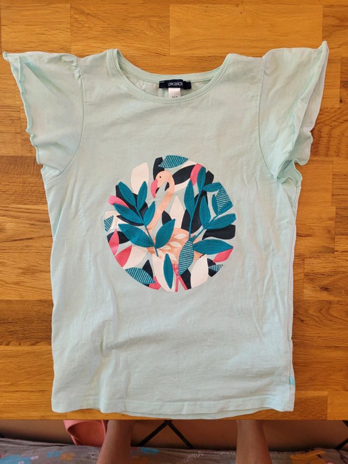 T shirt 8 ans excellent état