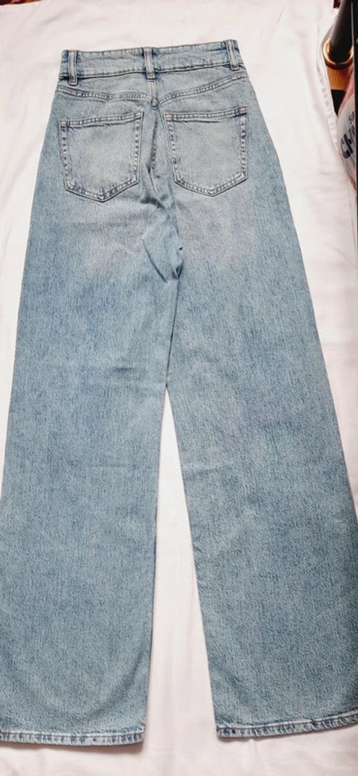 Jeans évasés troués - photo numéro 6