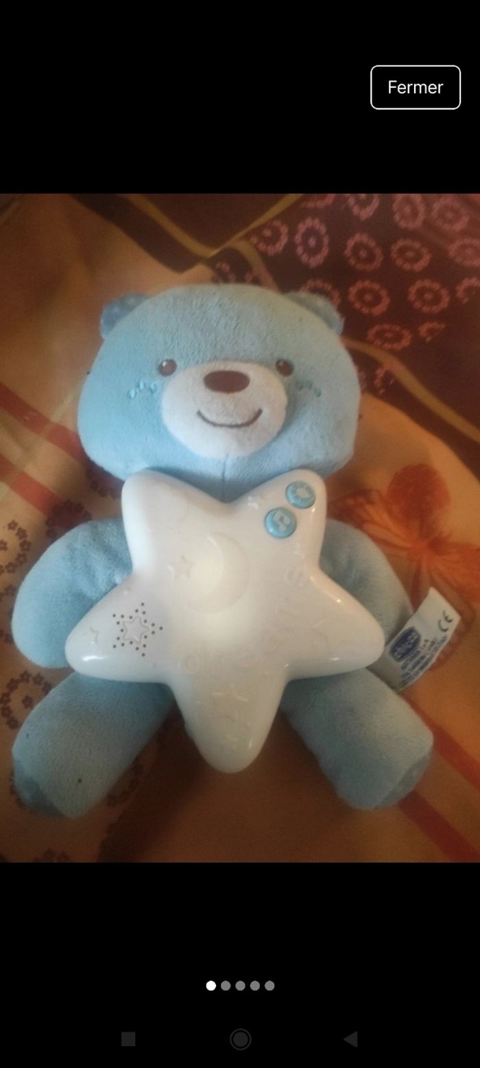 Peluche lumineux et musicale j9