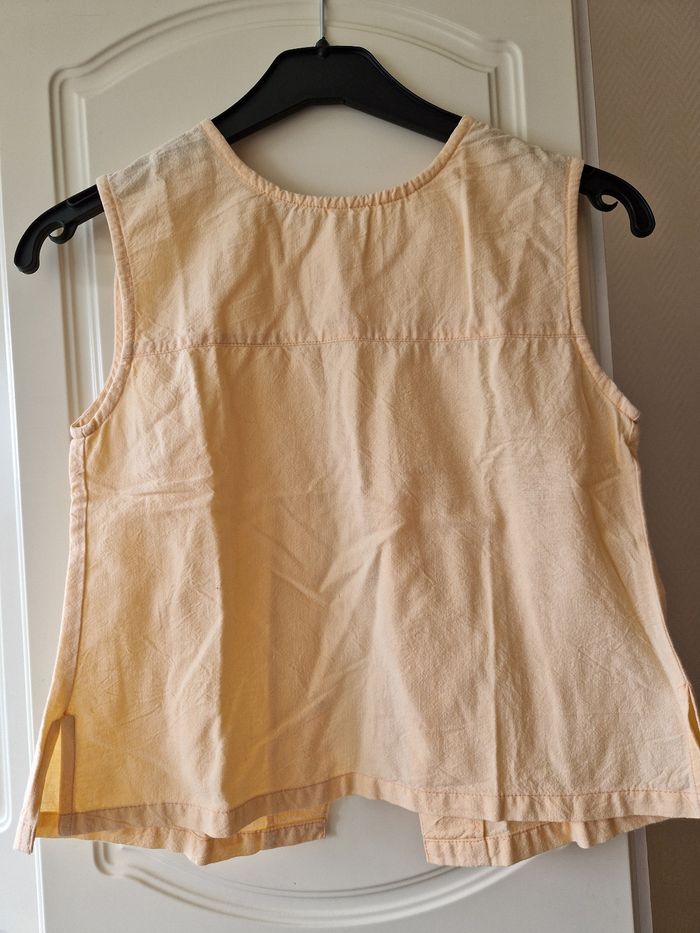 Haut boutonné à l'arrière 10 ans