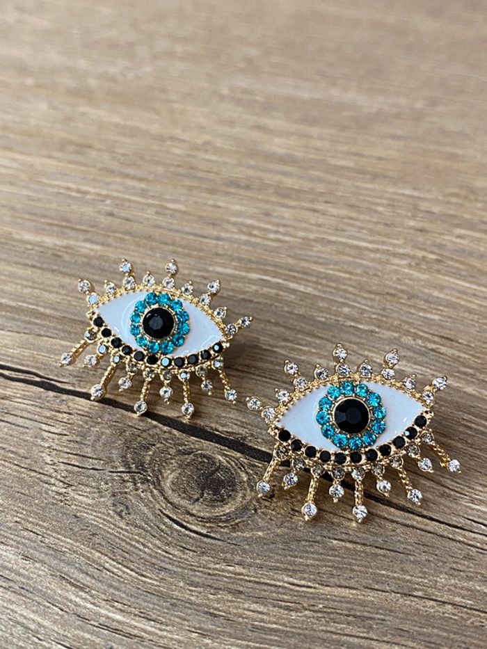 Boucles d’oreilles œil rétro