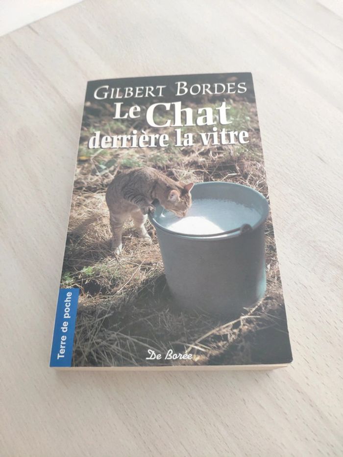 Livre poche le chat derrière la vitre Gilbert Bordes
