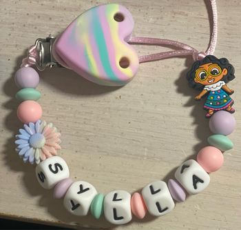 Attache tétine elcanto