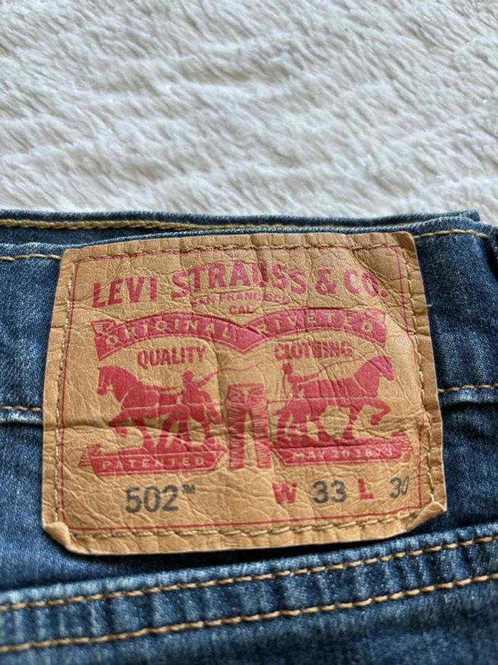 Jean Levi’s homme 502 slim Taper fuselé W33 L30 (42‑44 FR / L) Bleu foncé délavé État très bon - photo numéro 2