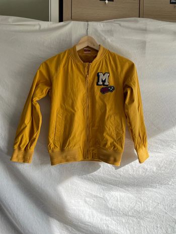 Veste 10 ans tape à l’œil