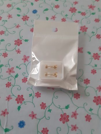 Boucle d'oreille fleur doré