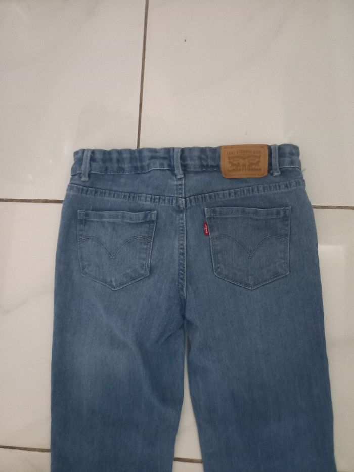 Levi,s fille taille 14 ans couleur bleu clair tres bonne etat - photo numéro 4
