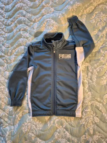 Veste Puma 3/4 ans TBE