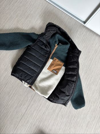 Veste chaude et doudoune sans manche 10 ans