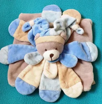 Doudou carré plat Ours pétales bleues - Doudou et compagnie