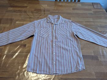 Chemise manches longues garçon 10 ans Gémo
Très bon état