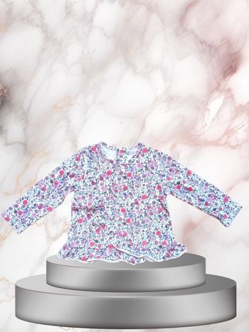 Le haut fleuri pour bébé fille taille 12 mois