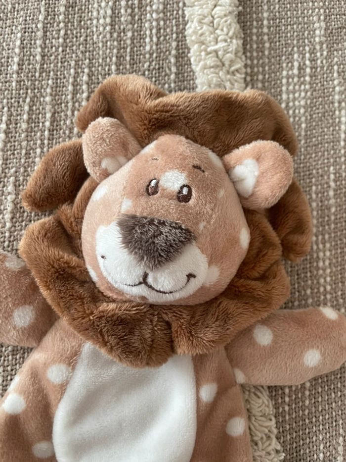 Peluche doudou plat d’éveil 25cm action lion marron pois blanc parfait état - photo numéro 2