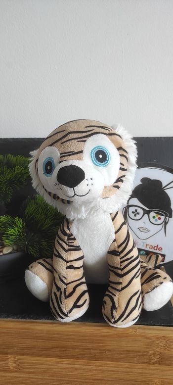 Peluche doudou Tigre noir beige gros yeux bleux Zeeman blanc noir Assis Rayé