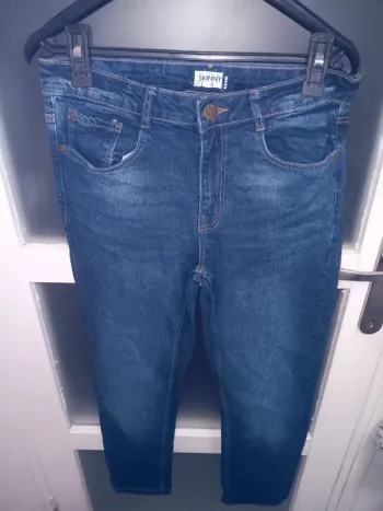 Jean skinny taille S bleu délavé coupe ajustée tendance
