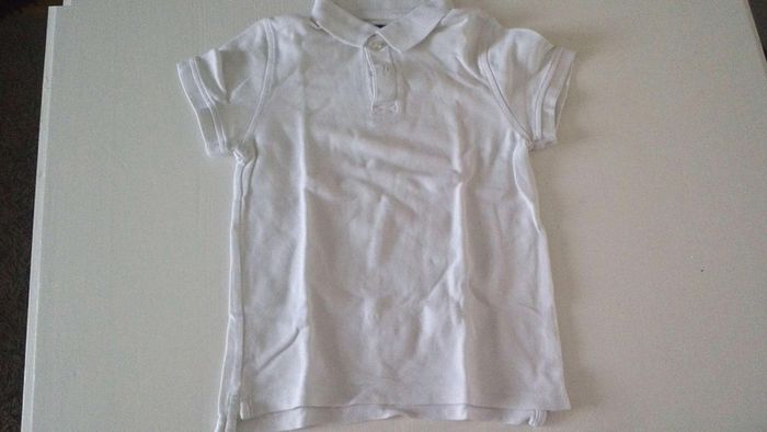 Polo blanc tres bon etat T8A