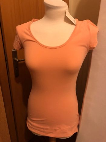 Haut orange clair taille s
