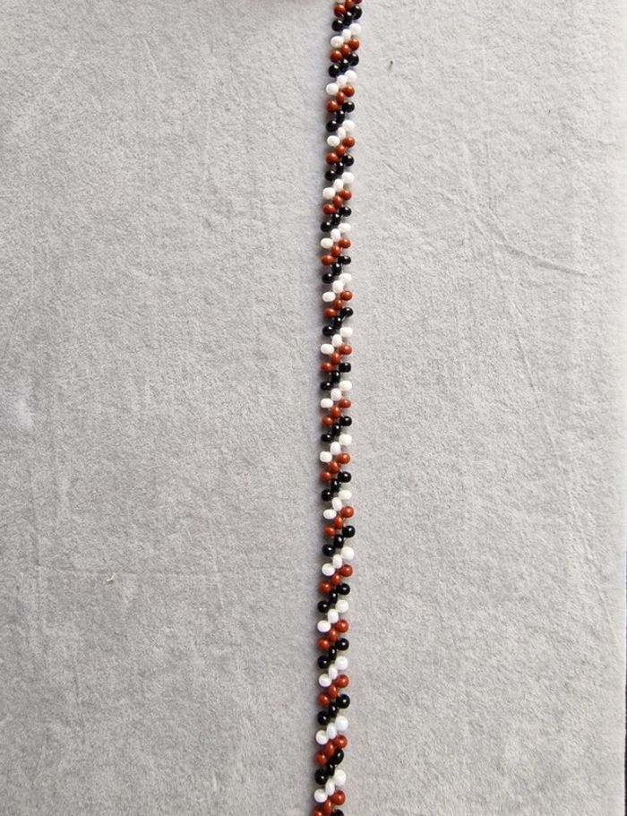 Bracelet noir blanc et marron - photo numéro 2