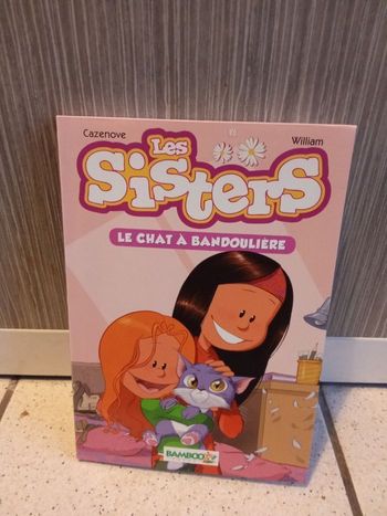 Livre les sisters le chat à bandoulière numéro 4 