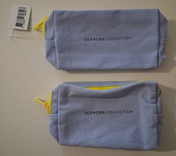 Lot de 2 trousses à maquillage zippées jaune et bleu