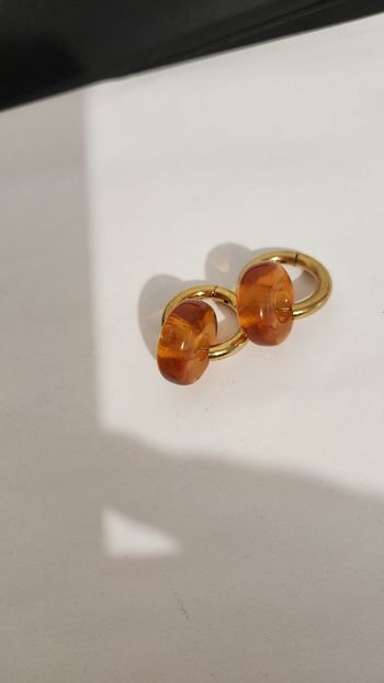 Jolie boucle d'oreille acier inoxydable et perle orange