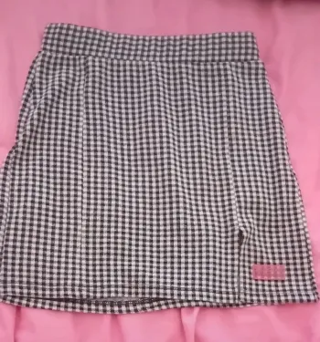 Superbe mini jupe à carreaux noir et blanc Bershka en parfait état