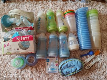 Lot tire-lait + biberons + accessoires