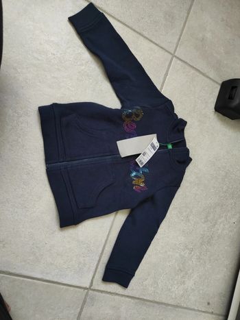 Gilet zippé Benetton 1 an neuf.