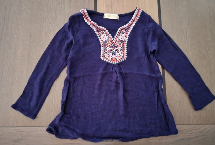 Tunique bleu marine brodée 8 ans en très bon état