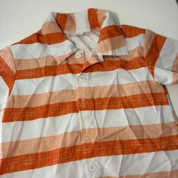Jolie chemise orange et blanche