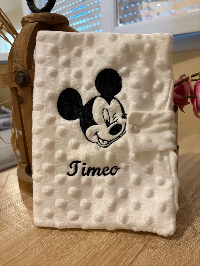 Protège carnet souris blanc