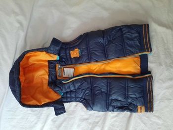 Doudoune sans manches taille 18 mois marque orchestra