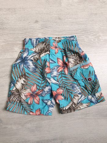 Short de bain turquoise avec fleurs tropicales Catimini 3 ans